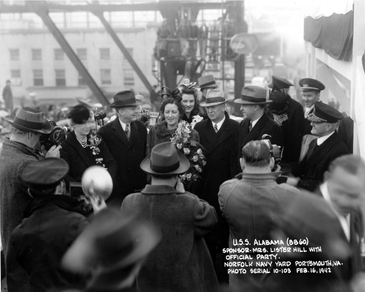 Sponsor Mrs. Lister Hill with officials at launching of USS Alabama (BB-60) at Norfolk Navy Yard, Portsmouth, VA. February 16, 1942. From the LCDR Carlyle M. Terry Collection.